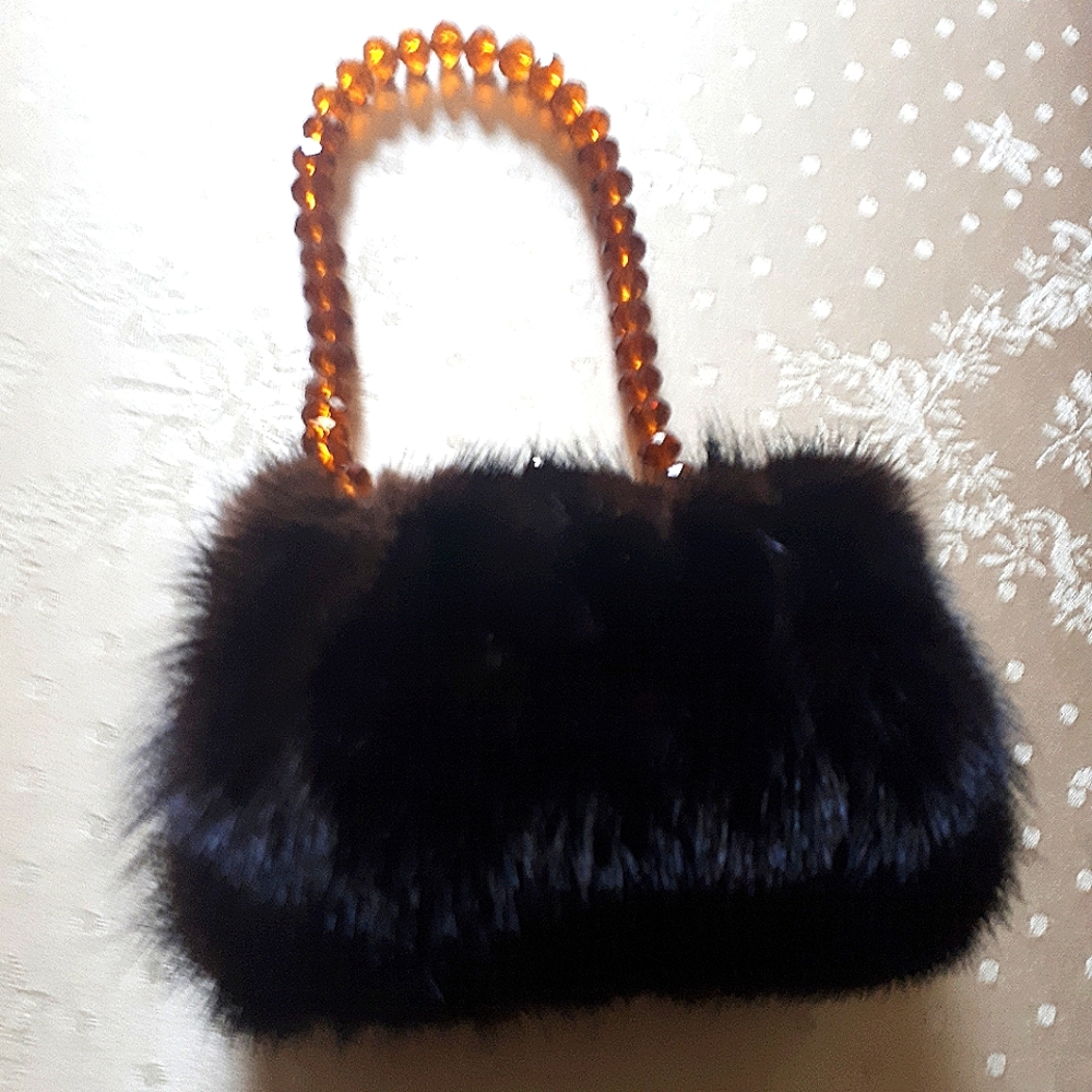 Polvere di Steĺleb Black mink clutch